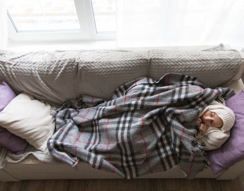 Person sleeping on a couch
