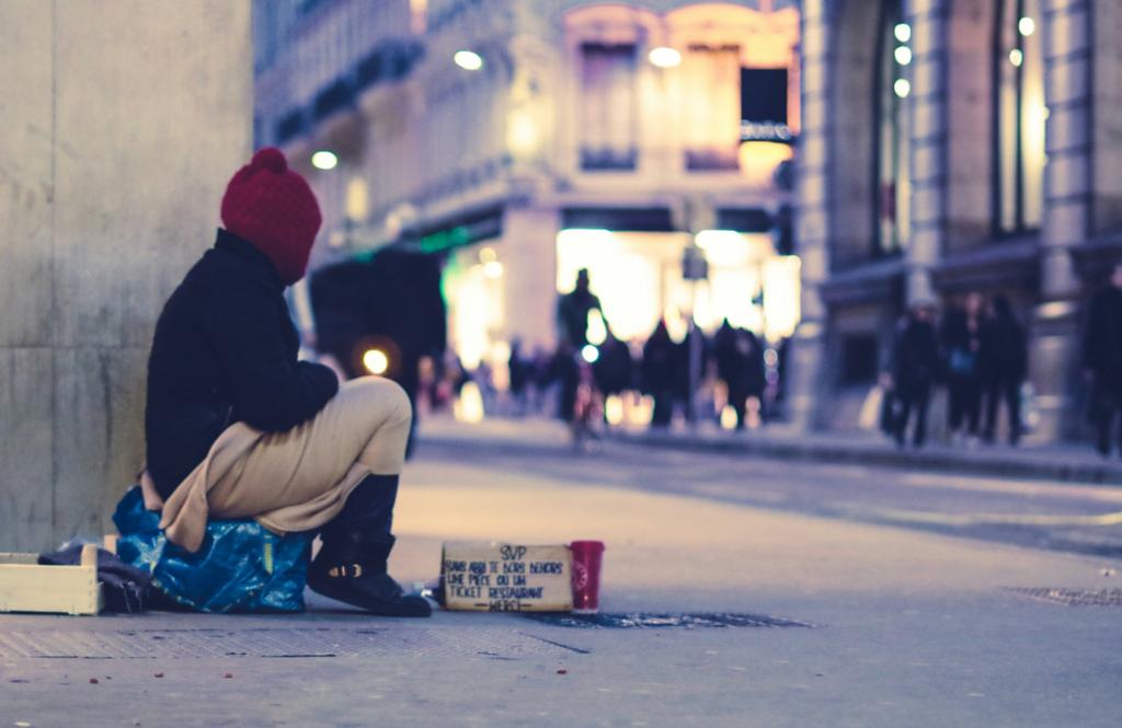 Person sitting on the street