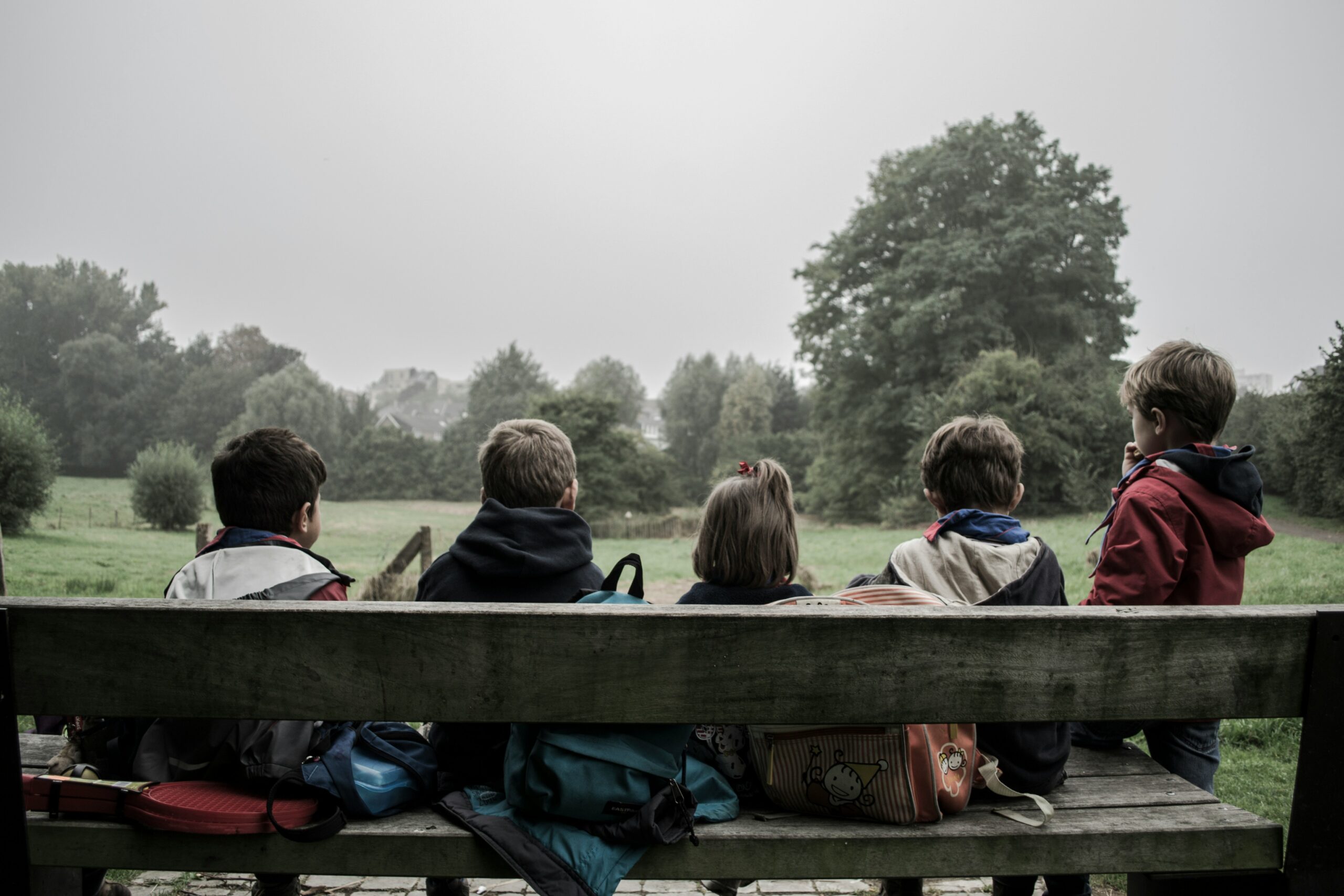 Kids sitting on bench