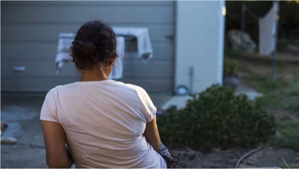 Person sitting outside