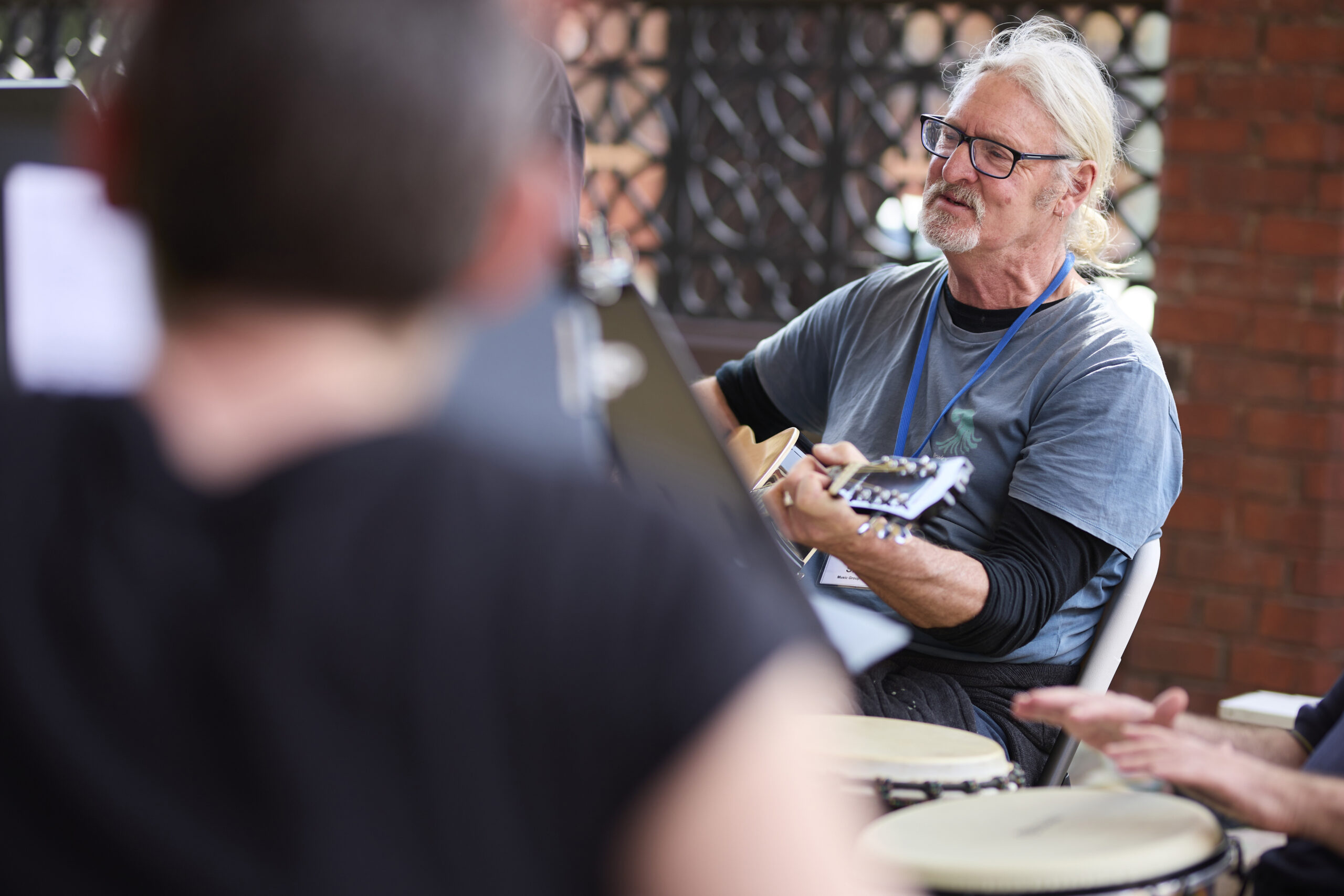 Person playing guitar